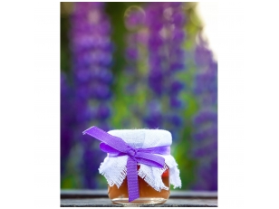 Mini honey jar decorated with linen and violet ribbon